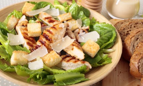 Caesar salad with griddled chicken and lettuce